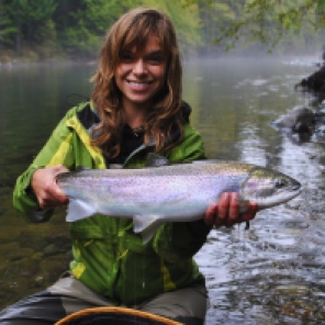 Kitty holding the first steelhead of the trip. Summer steelhead in the fall quite often get these rainbow/iridescent colours to them.